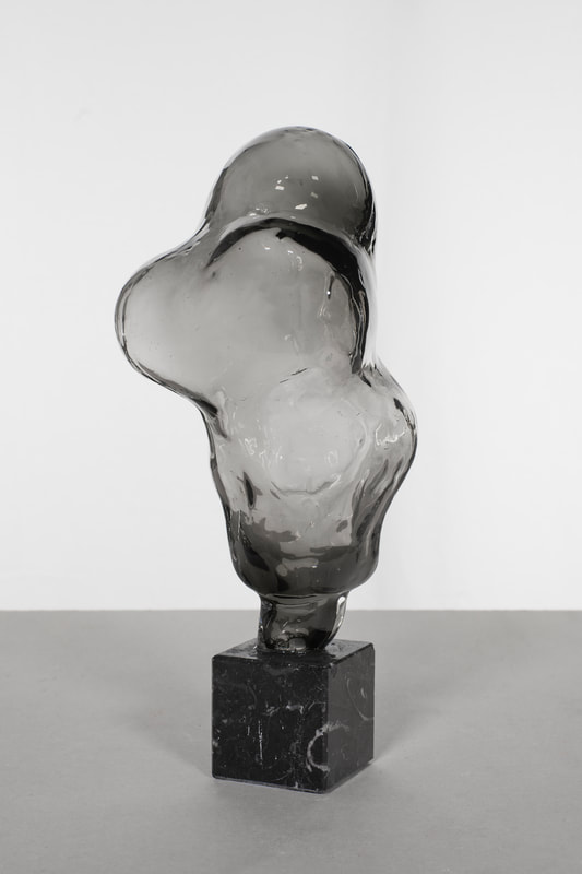 settled upright hand blown glass volume, black marble element , 31 x 11 x 9 cm ca, 2025 